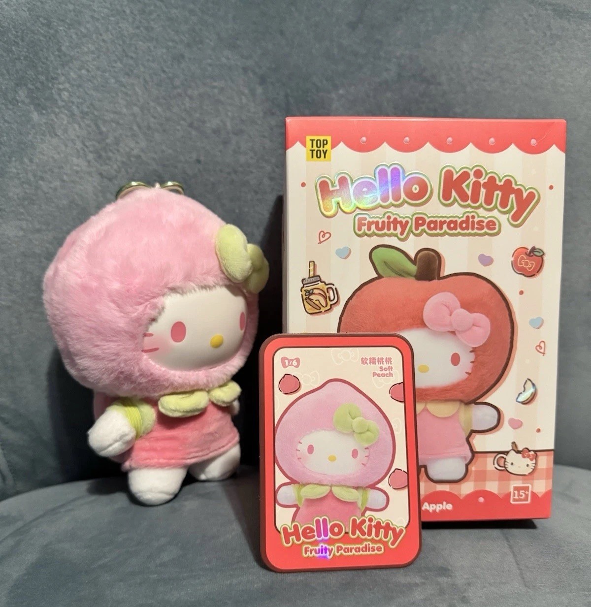 Top Toy Hello Kitty Fruity Paradise Opened Plush Pendant – Soft Peach