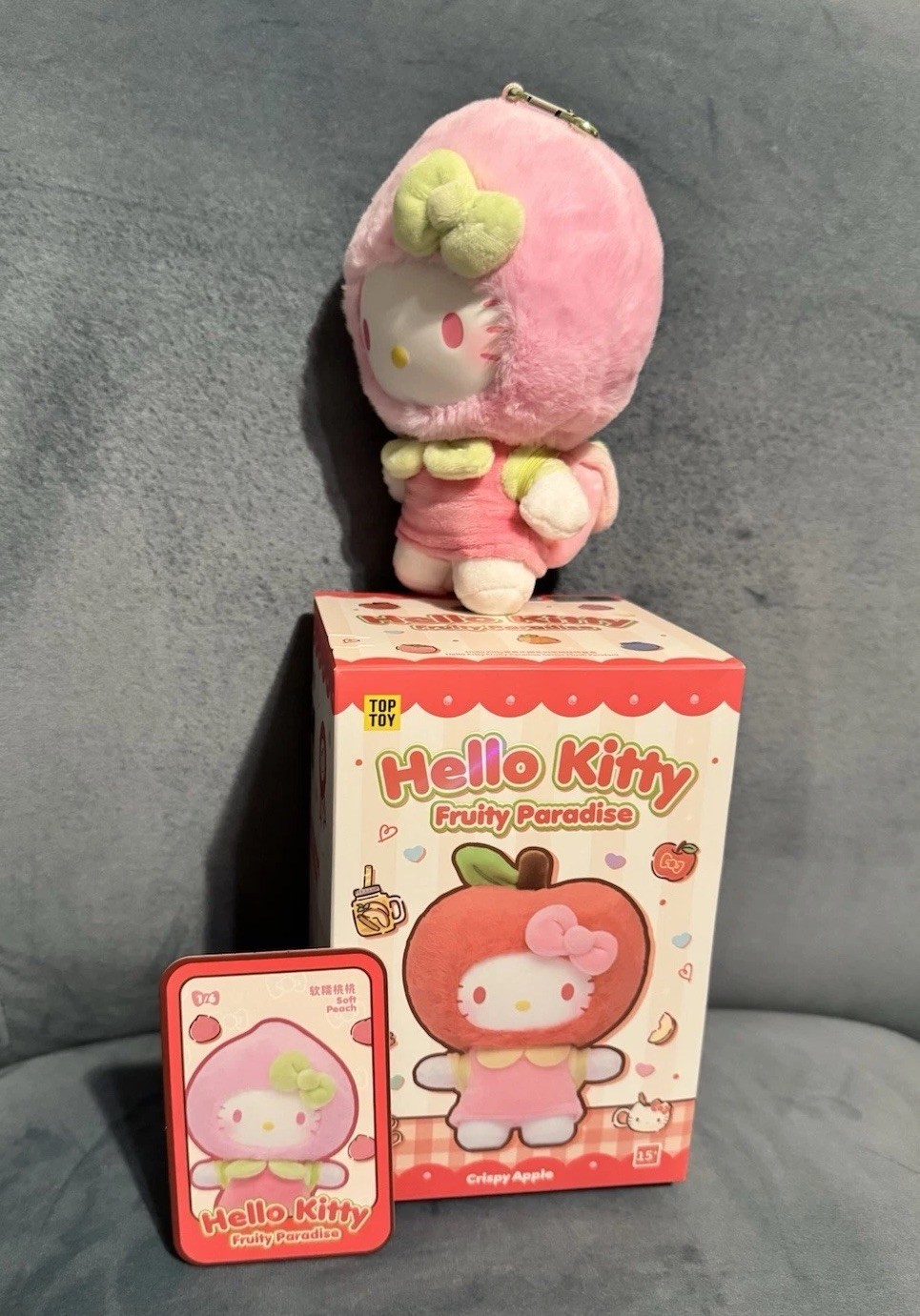 Top Toy Hello Kitty Fruity Paradise Opened Plush Pendant – Soft Peach
